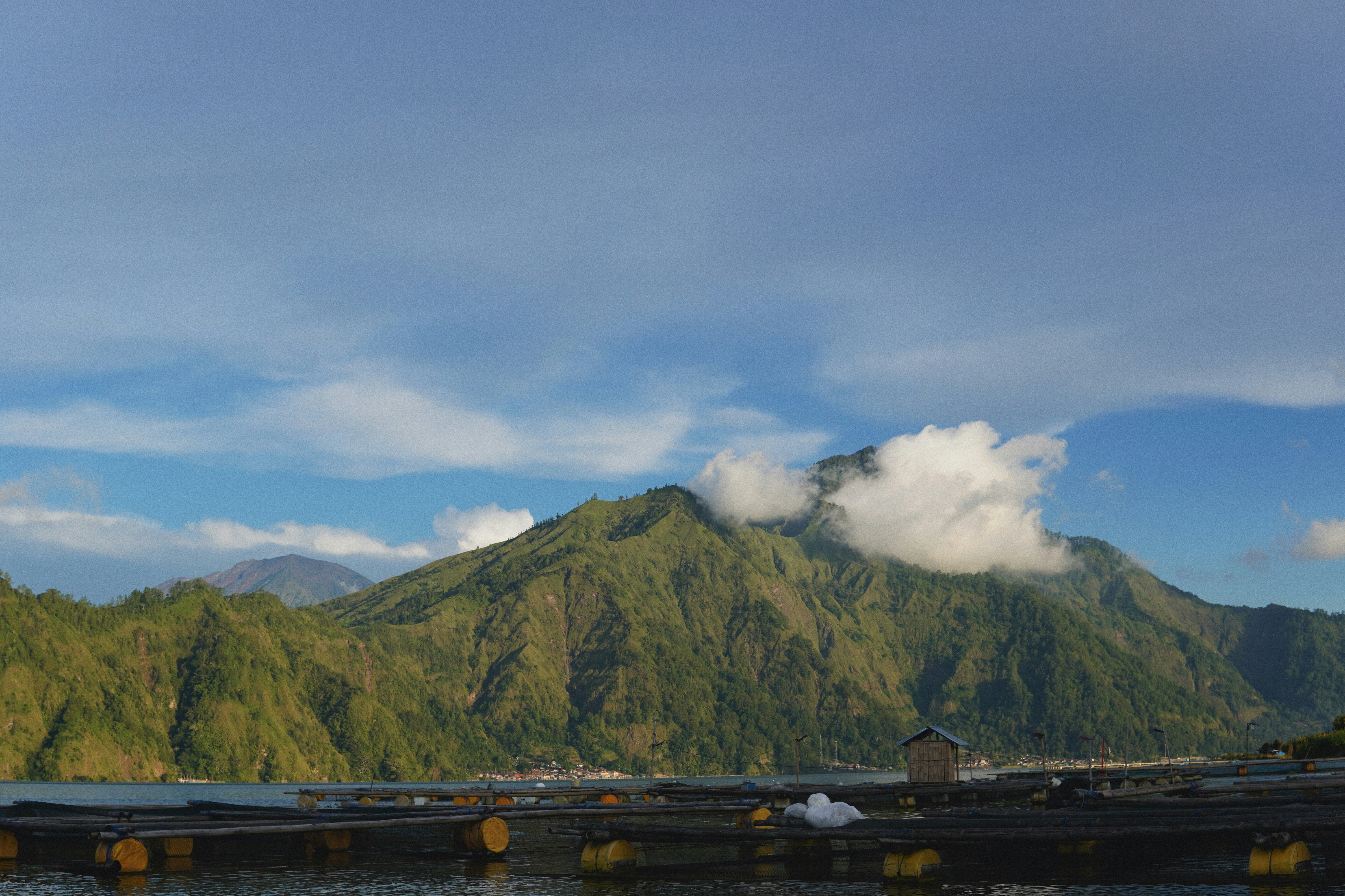 a view of a mountain and a body of water