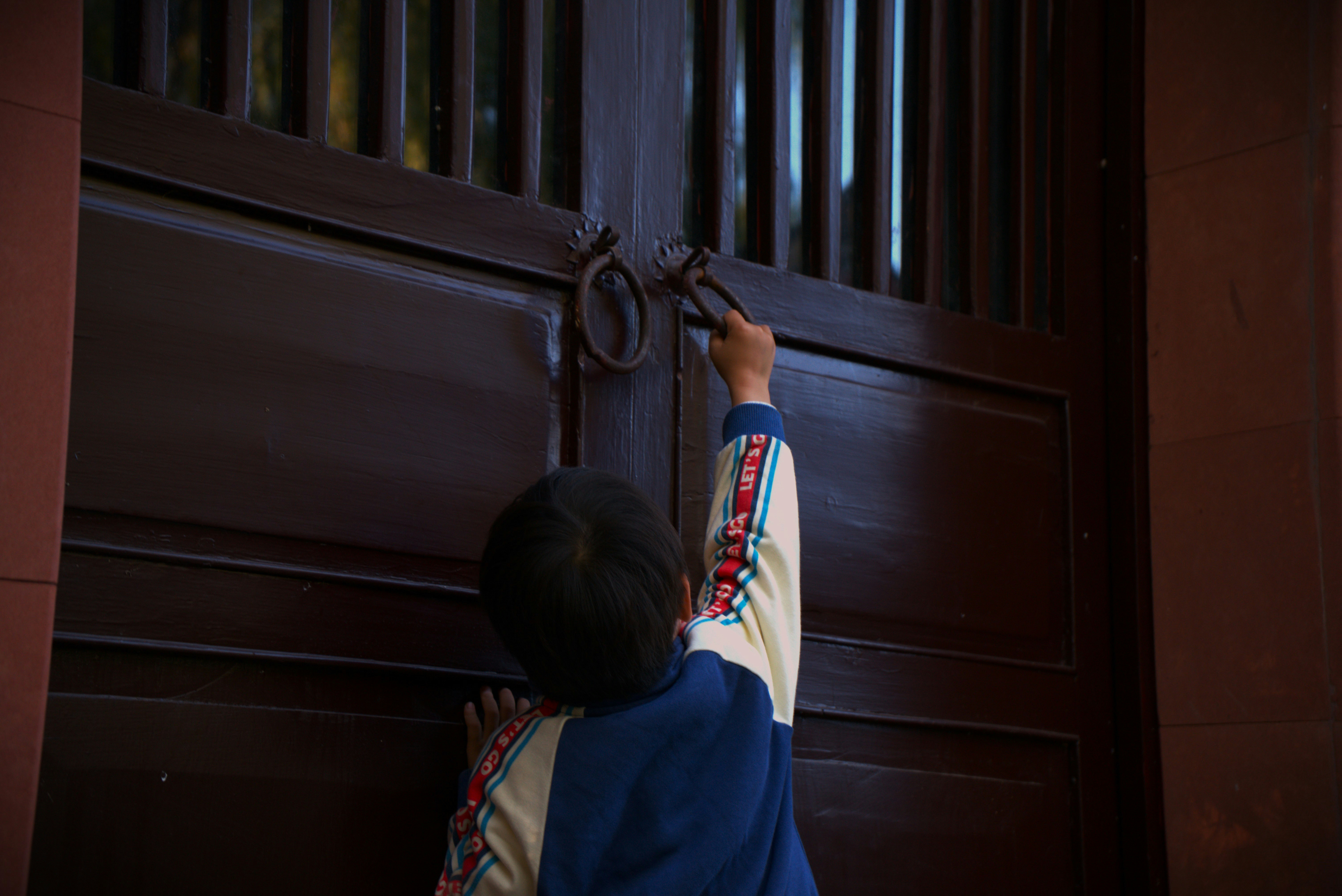 Ruler measuring width of door frame.