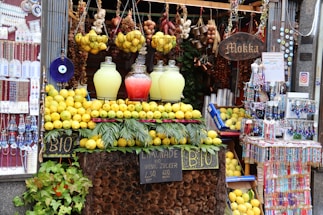A welcoming storefront of Mittal Agro with fresh tamarind and turmeric displayed.