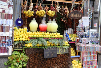 A vibrant marketplace with people using laptops and smartphones connected to lemon wi-fi's off-grid network.