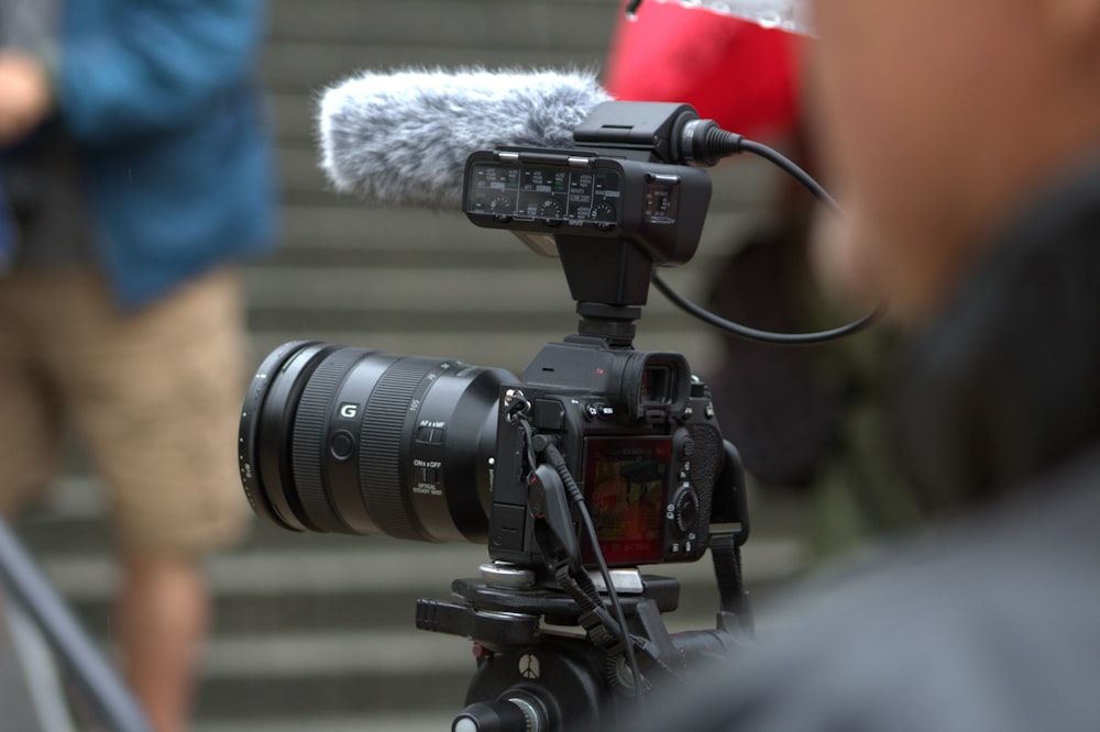 a camera with a microphone attached to it