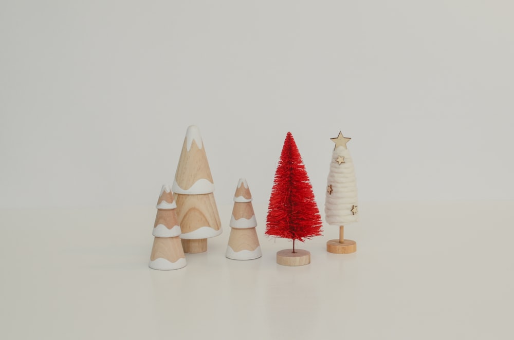 a group of small wooden trees sitting next to each other