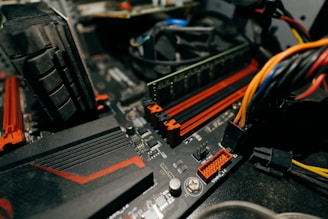 a close up of a computer motherboard with wires
