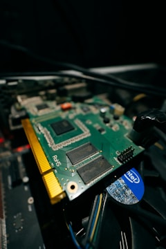 a close up of a computer motherboard with wires