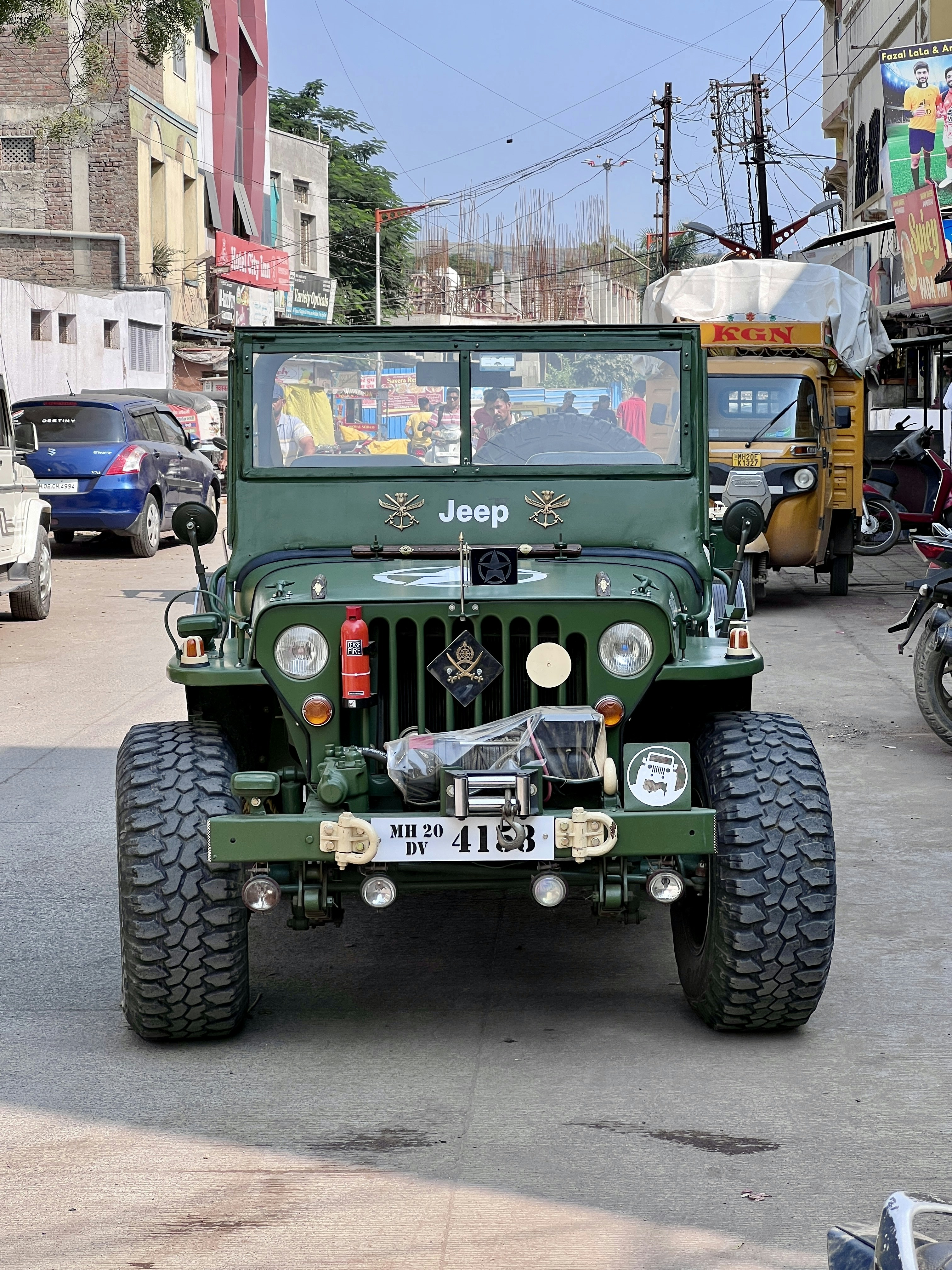A green jeep parked on the side of a road photo – Free Car Image on ...