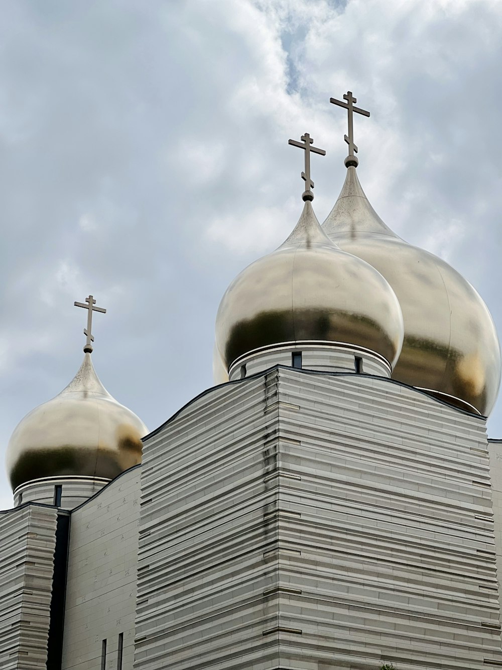 a church with three crosses on top of it