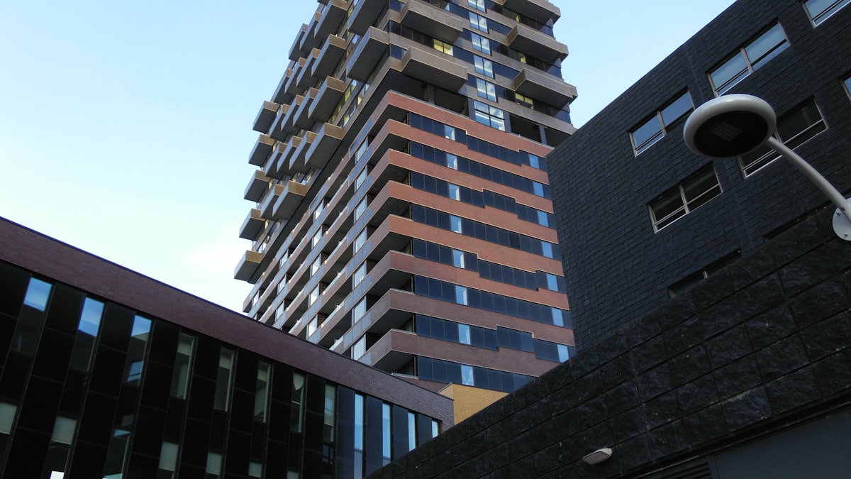 Modern condominium building with glass facade