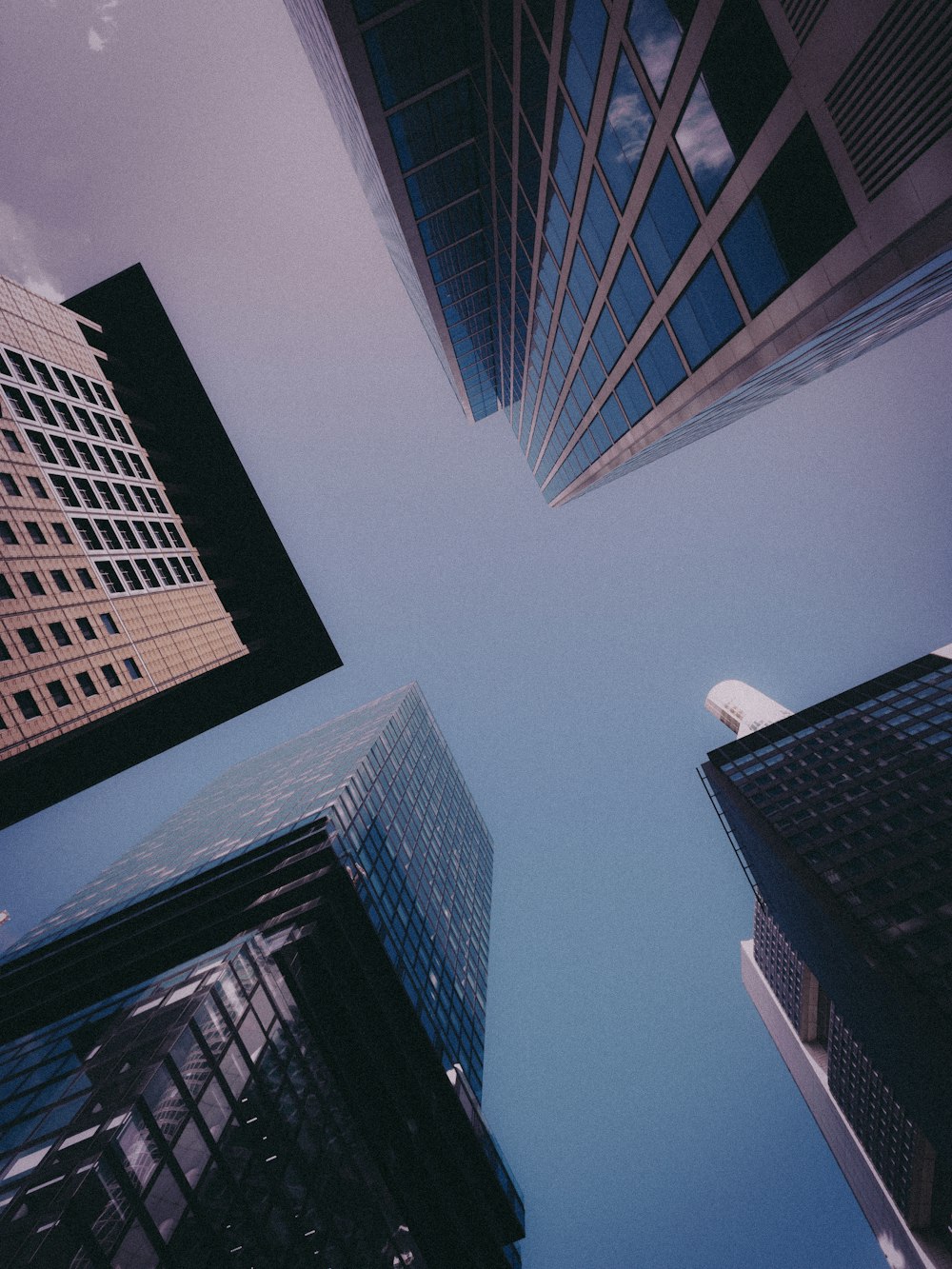 a group of tall buildings in a city