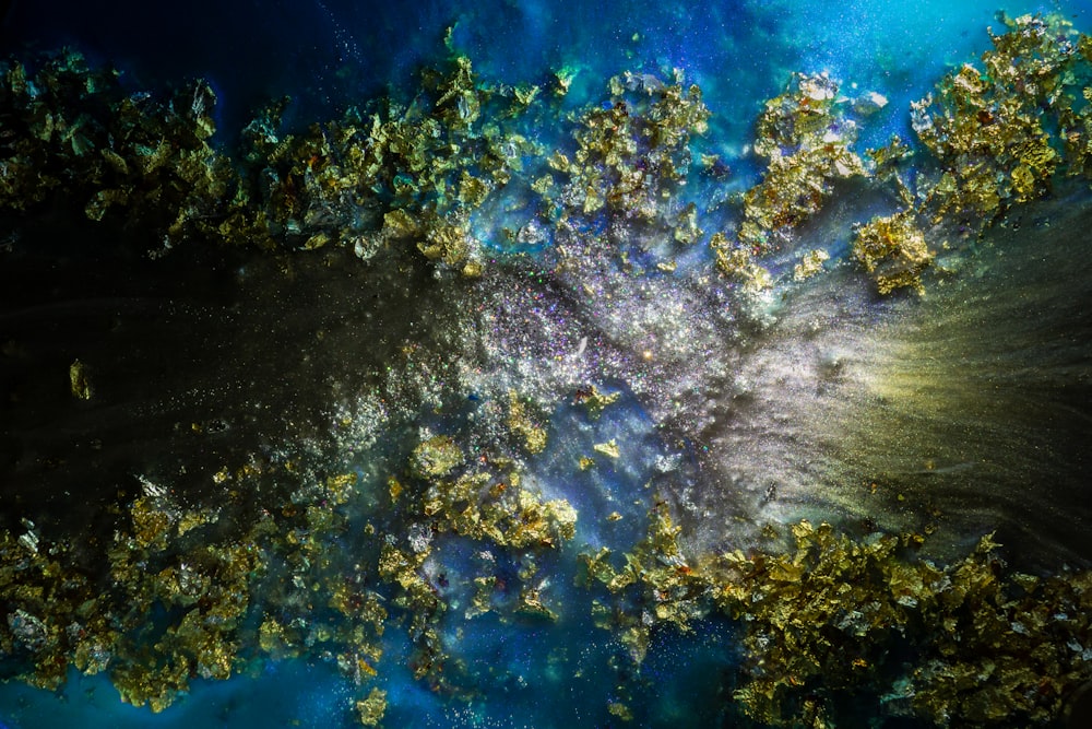 an aerial view of a blue and yellow ocean