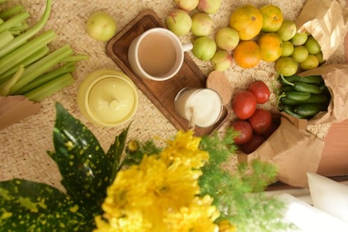 An assortment of fruits with a daily meal setup.