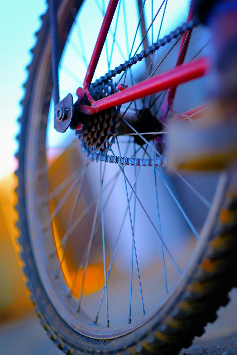 a close up of a bicycle tire and spokes