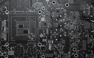 a black and white photo of a computer motherboard