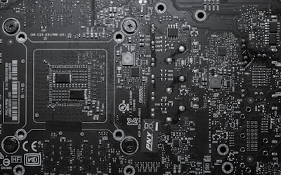 a black and white photo of a computer motherboard