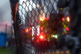 A 24/7 emergency service team arriving promptly with fencing materials at night.