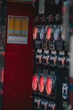 Close-up of a gas extinguishing system control panel with illuminated indicators.