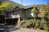 A beautifully renovated Japanese home exterior showcasing a blend of old and new design.