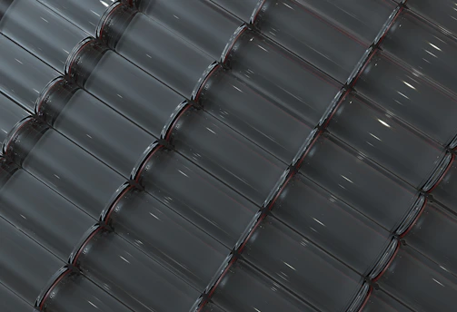 Rows of finished glass products ready for delivery in the factory.