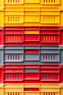 a large stack of yellow and red boxes