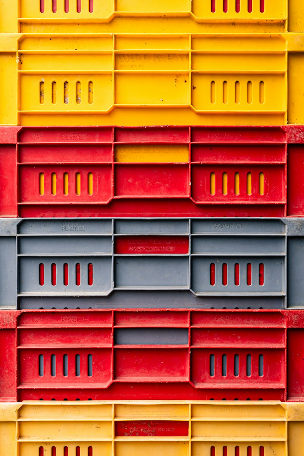 a large stack of yellow and red boxes