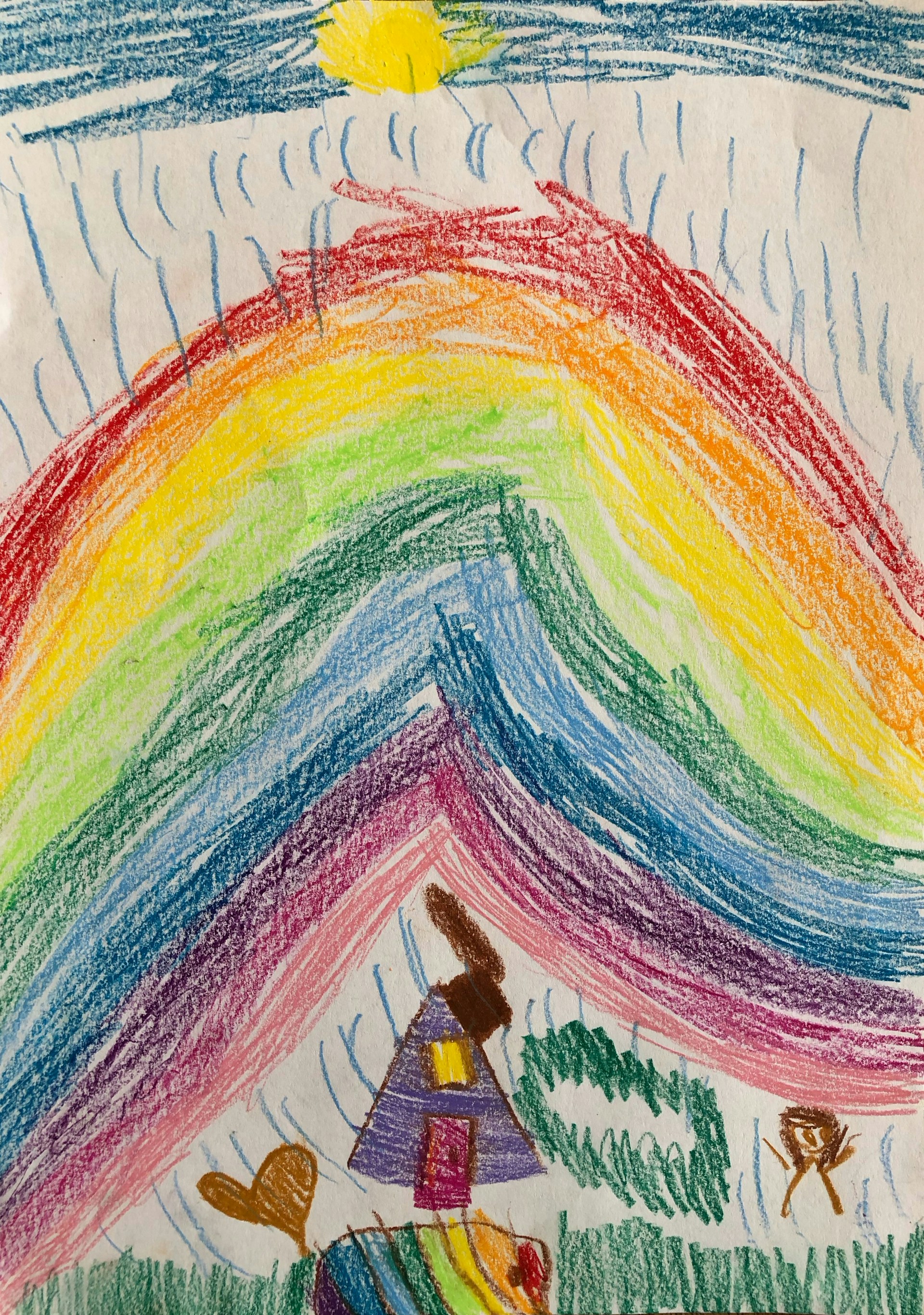 a child's drawing of a rainbow