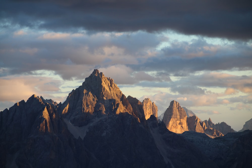 a view of a mountain range at sunset