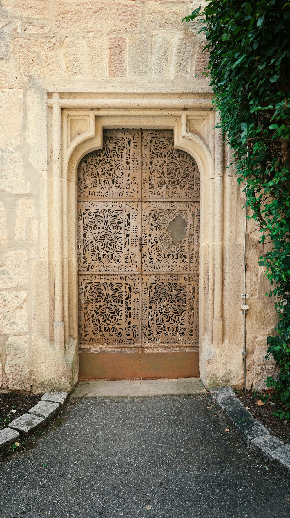 a large wooden door in a stone building