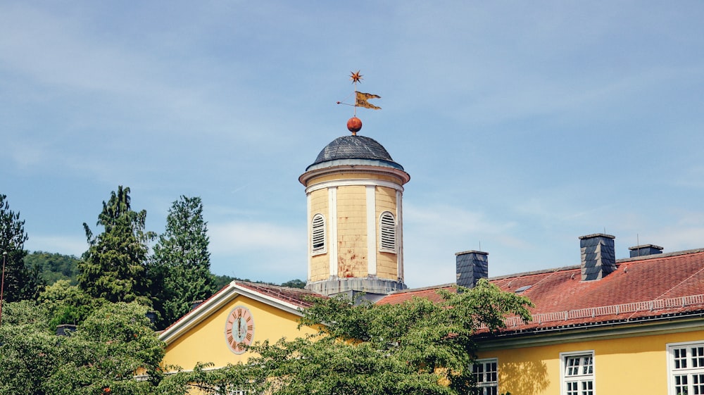 a building with a tower and a clock on it