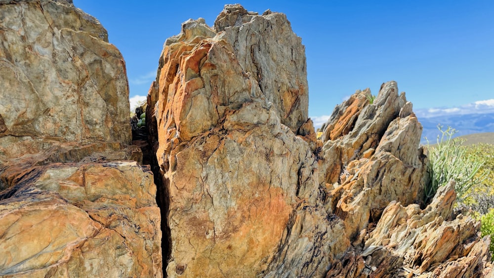 a large rock formation in the middle of a desert