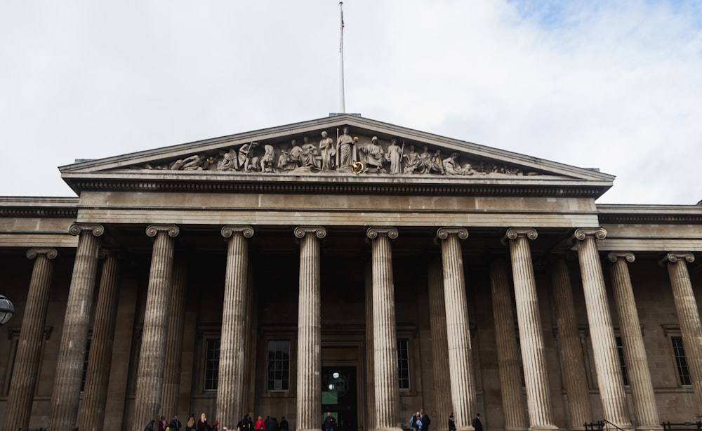 a group of people standing in front of a building