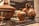 A collection of ancient pottery items displayed in a museum setting, featuring intricate designs and patterns. The pottery includes a large bowl with a lid, a small vase, and a jug, all adorned with animal motifs and floral patterns.