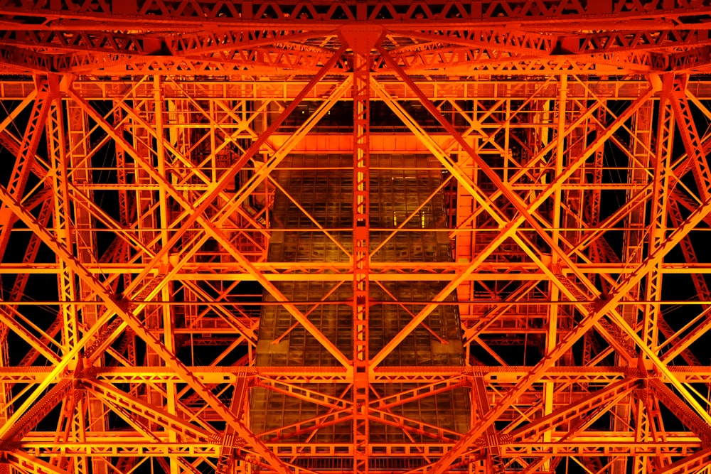 a close up of a metal structure with a clock on it