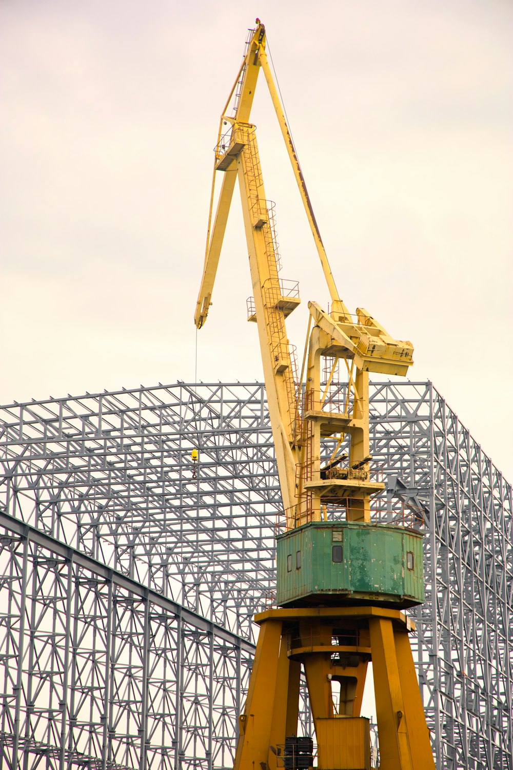 a large crane is on top of a building