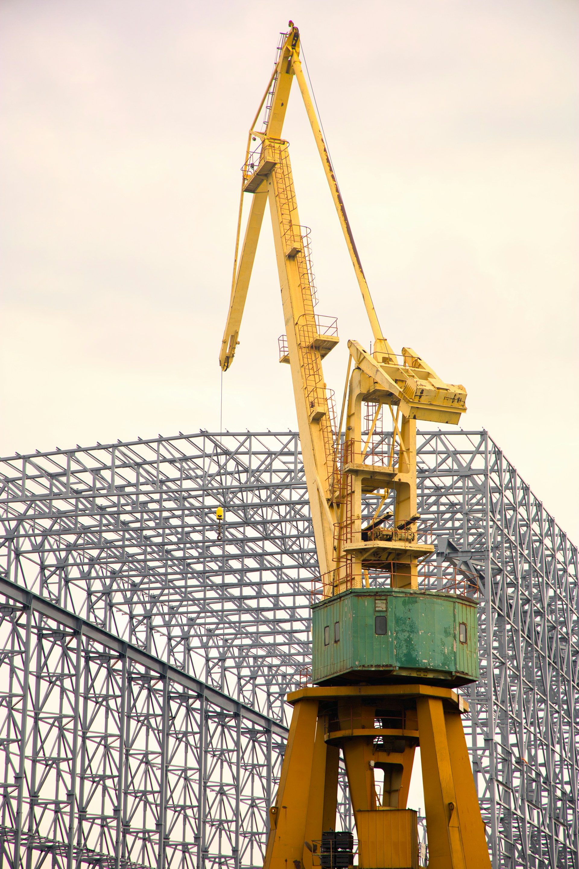 a large crane is on top of a building