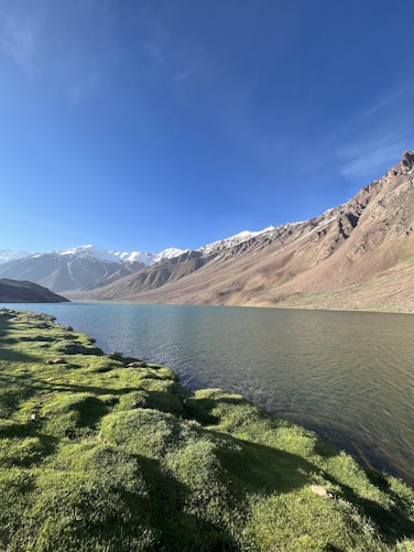 a view of a mountain range and a body of water