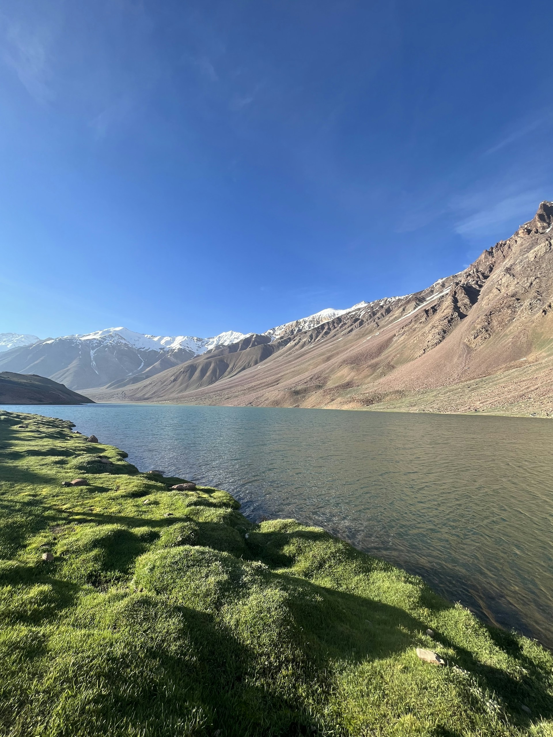 a view of a mountain range and a body of water