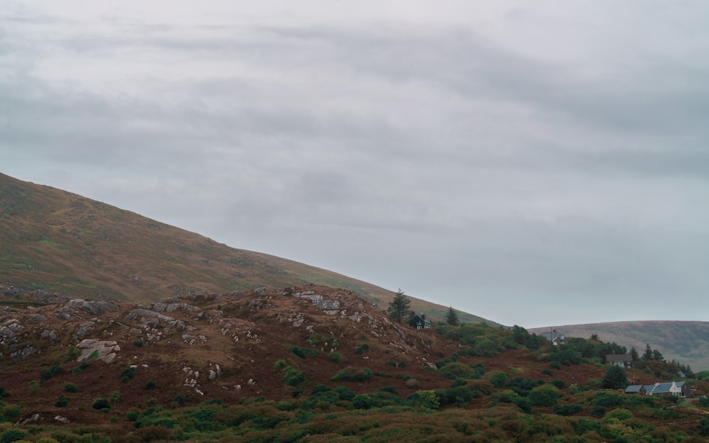 a hill with a house on top of it