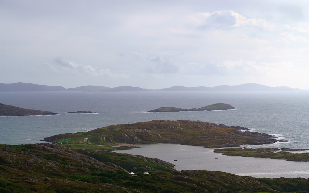 a view of a body of water from a hill