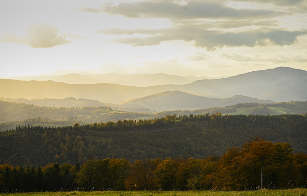 a view of a mountain range at sunset