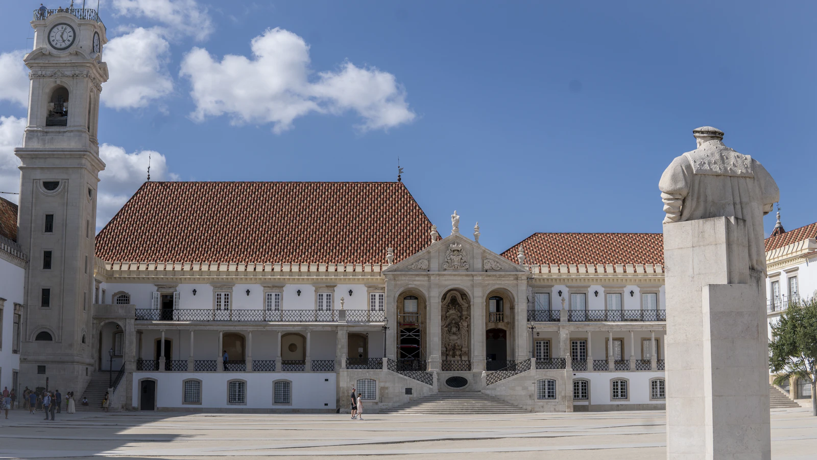 University of Coimbra clock tower against blue sky, Coimbra, Portugal