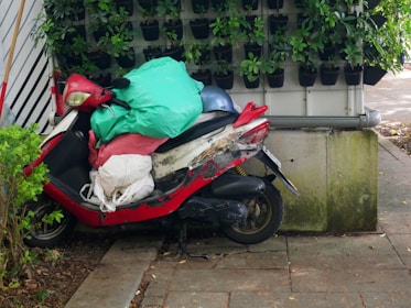 a motor scooter parked on the side of the road