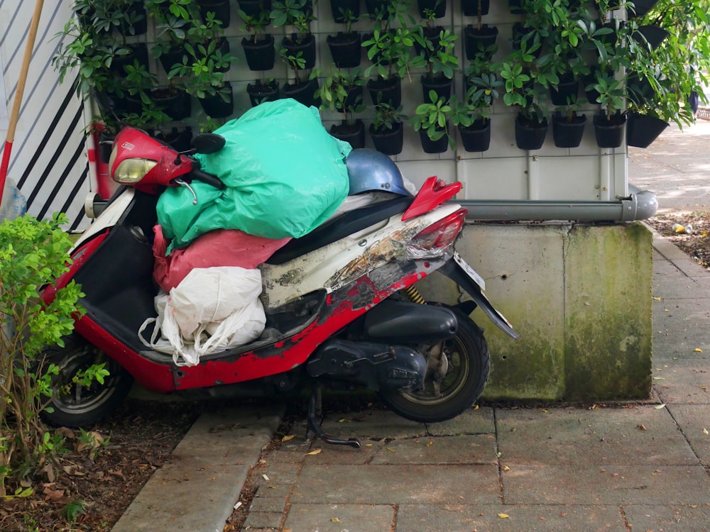 a motor scooter parked on the side of the road