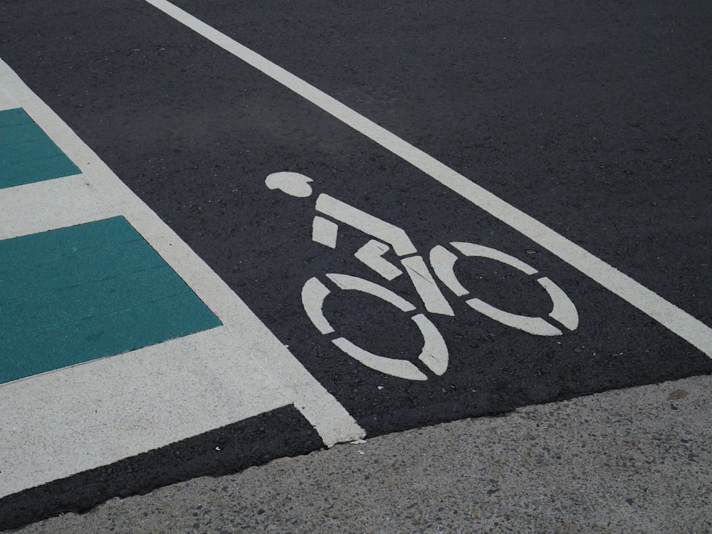 a bicycle lane painted on the side of a road