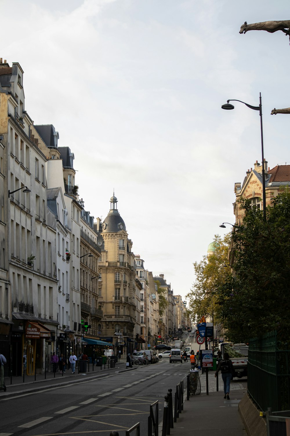 a city street lined with tall buildings