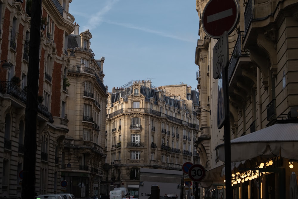 a city street filled with lots of tall buildings