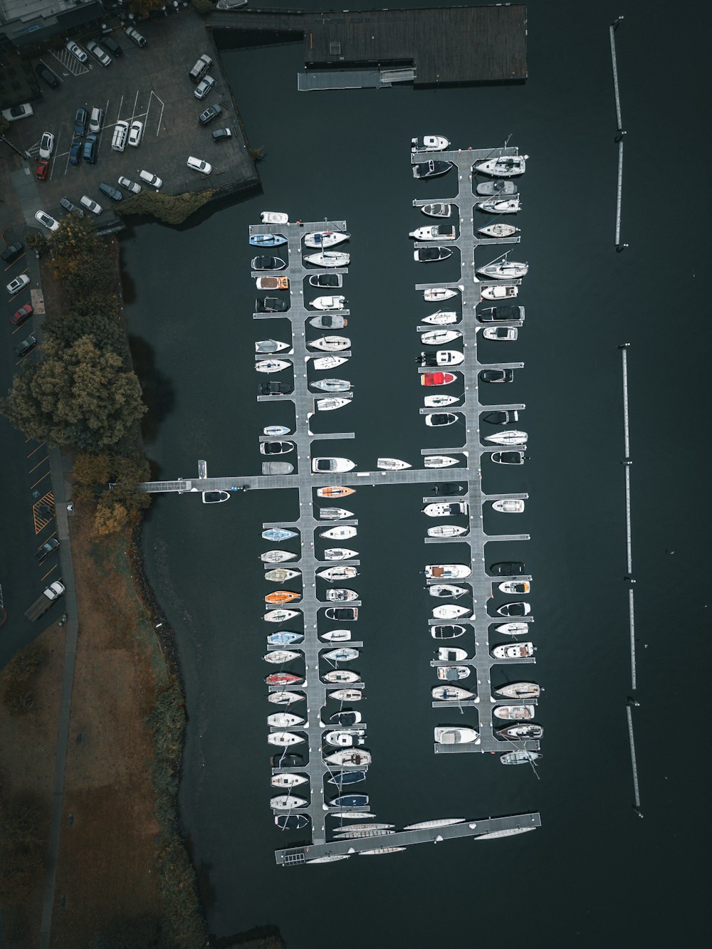 an aerial view of boats docked at a marina