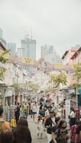 A bustling market scene in an Asian city.