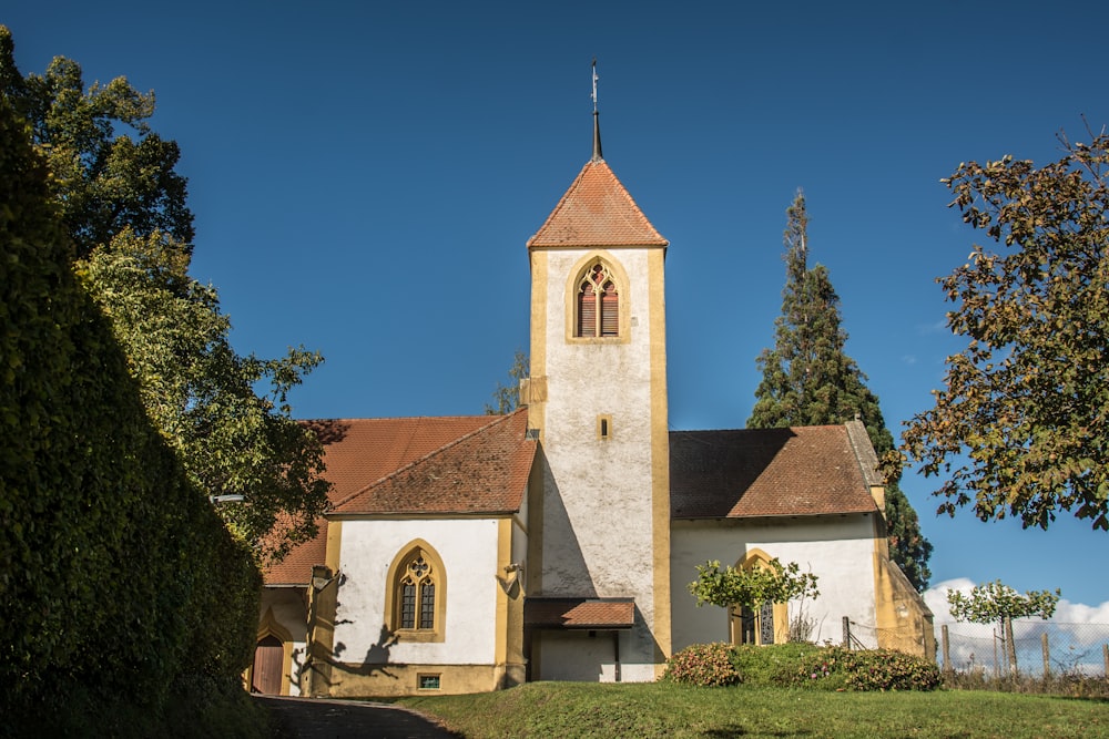 a church with a steeple and a steeple on top of it