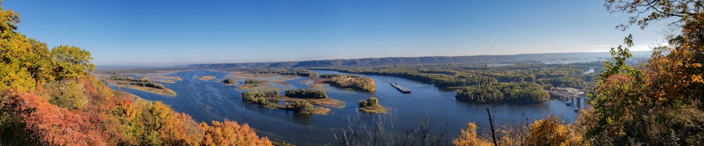 a view of a river surrounded by trees