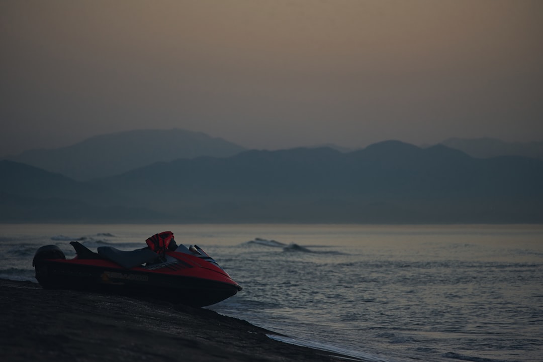 a person on a jet ski in the water,