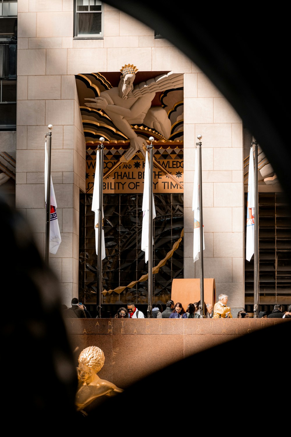 a building with a statue of a man on it